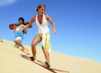 9 Adventures in South Africa for Adrenaline Junkies Sandboarding near Cape Town, South Africa