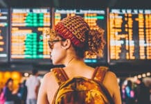 Woman at airport with cheap flights